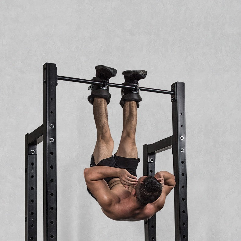 Anti Gravity Inversion Boots hanging on pull-up bar for spinal decompression